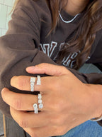 Amore Princess Ring and Amore Brilliance Ring in 18K gold with natural diamonds