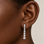 Graduated Diamond Drops by STUDIOHERSBY worn on the ear