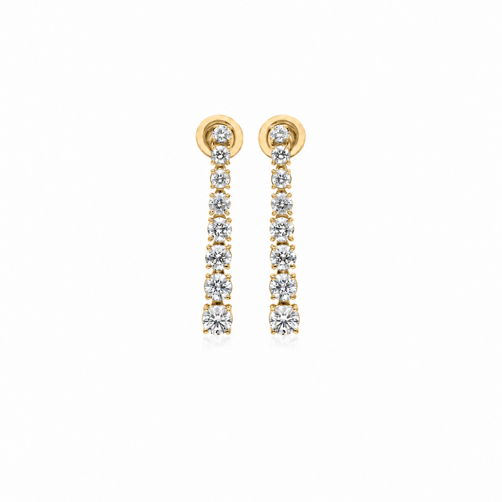 Graduated Diamond Drops by STUDIOHERSBY in 18K yellow gold with natural diamonds