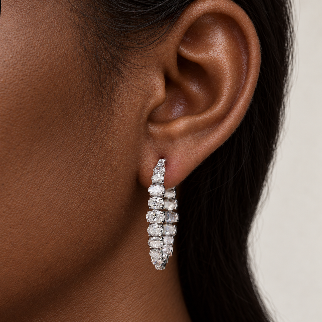 Grand Oval Diamond Hoops by STUDIOHERSBY worn on the ear