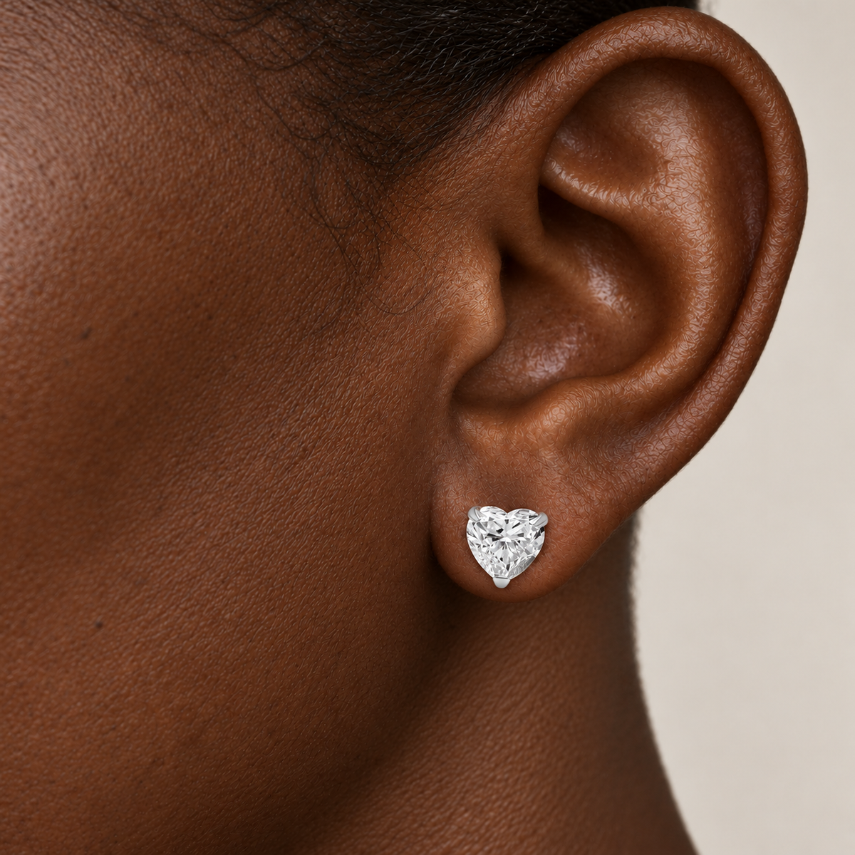 Heart Solaria Stud by STUDIOHERSBY worn on the ear