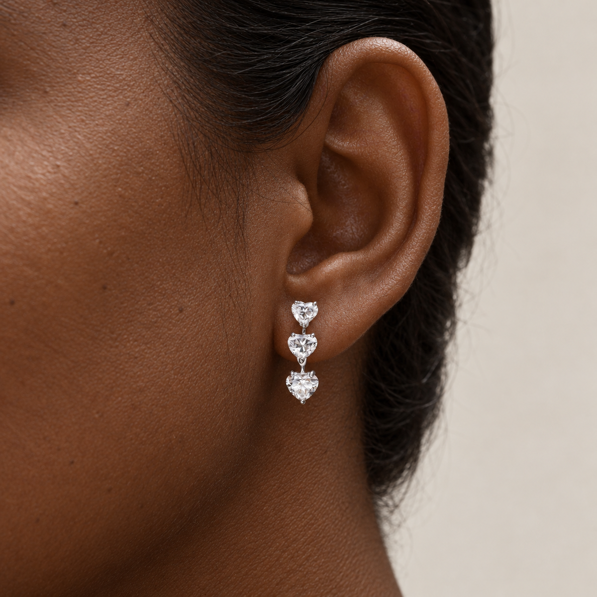 Heart Trio Drops by STUDIOHERSBY worn on the ear