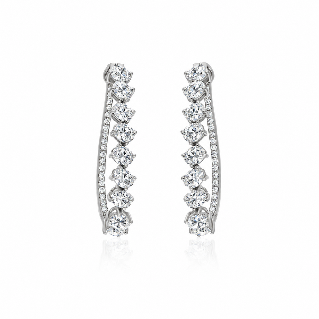 Oval Cascade Diamond Hoops by STUDIOHERSBY in 18K white gold with natural diamonds