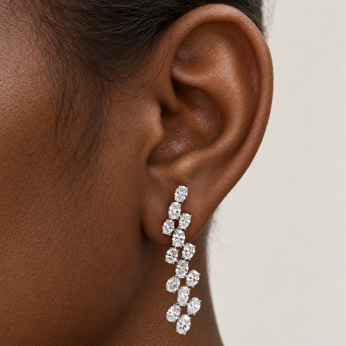 Oval Rhythm Diamond Drops by STUDIOHERSBY worn on the ear