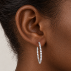 Pavé Diamond Hoops by STUDIOHERSBY worn on the ear