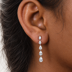 Pear Cascade Diamond Drops by STUDIOHERSBY worn on the ear