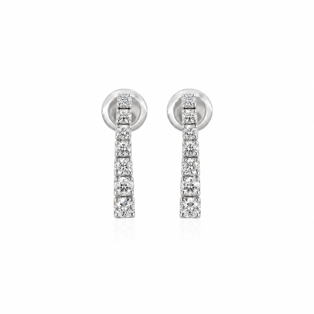 Petit Graduated Diamond Drops by STUDIOHERSBY in 18K white gold with natural diamonds