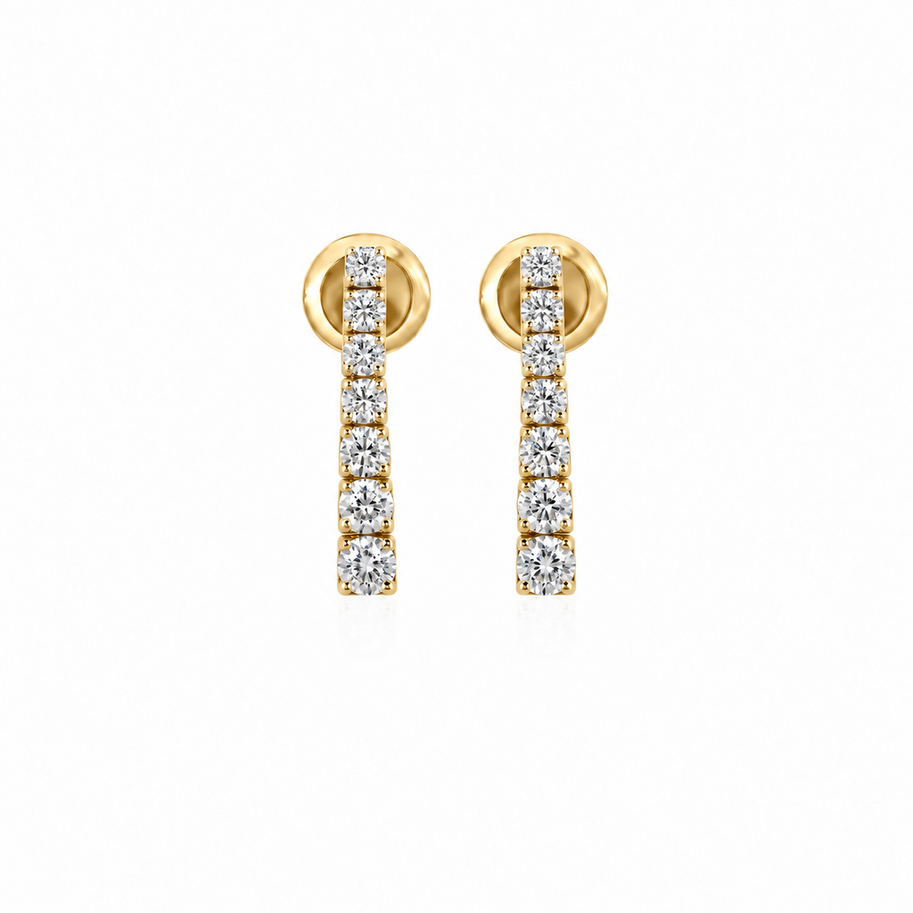 Petit Graduated Diamond Drops by STUDIOHERSBY in 18K yellow gold with natural diamonds