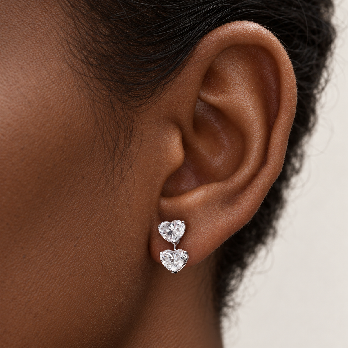 Twin Heart Diamond Drops by STUDIOHERSBY worn on the ear